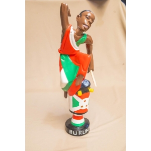 Man Sitting on Djembe Figurine